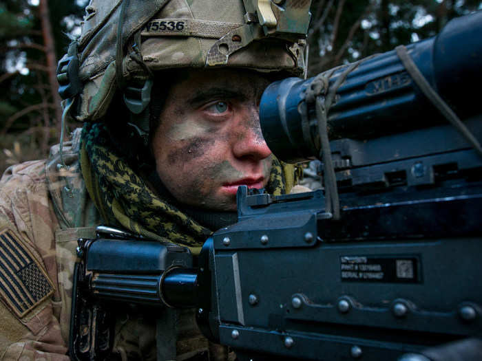 A Soldier scans the terrain over the sights of his M-249 machine gun on November 18 during an Allied Spirit VII training event in Grafenwoehr, Germany.