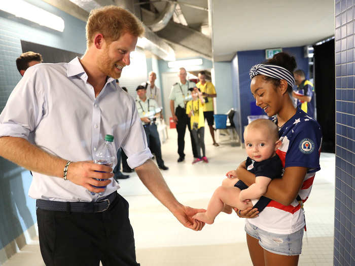 Later, he  took time to hang out with this little guy behind the scenes of one Invictus event.