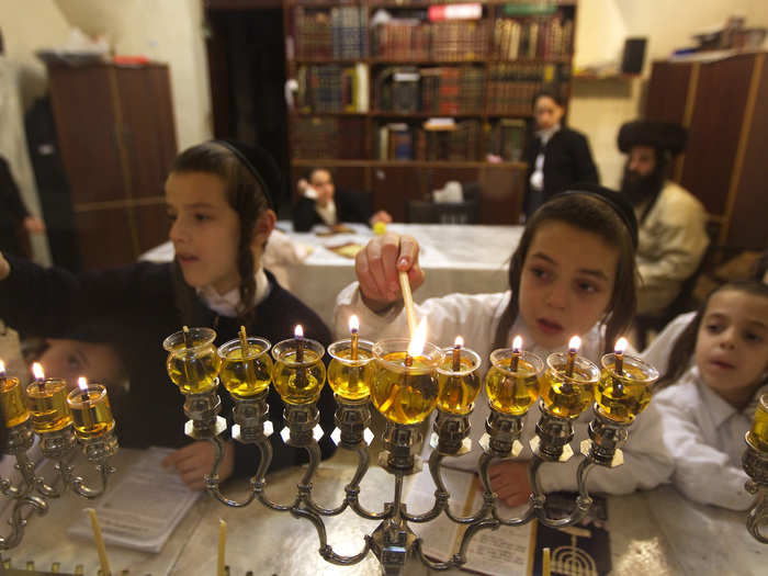 Jewish families around the world light candles on the eight nights of Hanukkah.