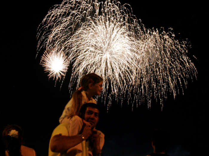 Fireworks help ring in Christmas Day in Buenos Aires, Argentina. Some people stay up all night talking with friends and family and sleep through the holiday.