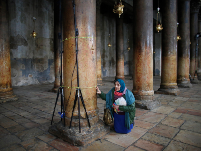 Christians come to worship at the Church of the Nativity, the site believed to be the birthplace of Jesus, in the West Bank town of Bethlehem.