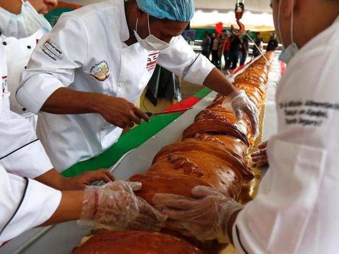 A Christmas dinner is incomplete in Venezuela without the traditional ham bread, which is rolled with olives, raisins, ham, and sometimes bacon stuffed inside.