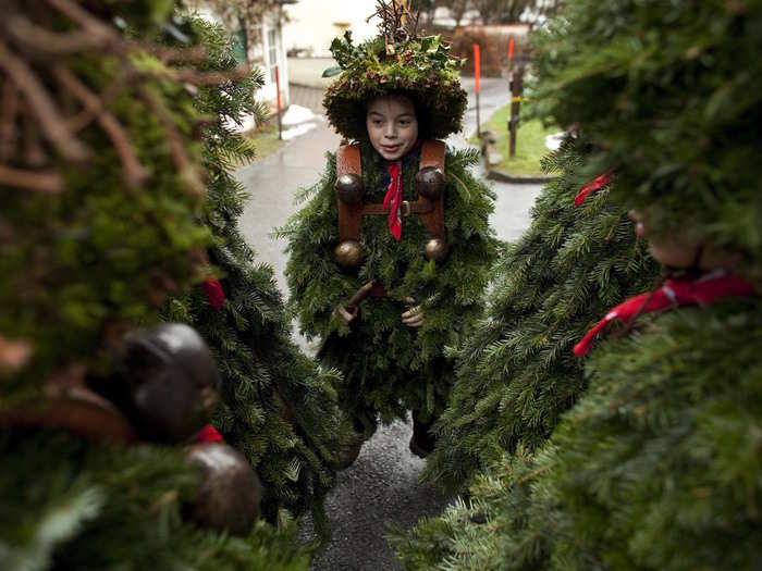 A festival in Appenzell, Switzerland, has people dress in elaborate, homemade costumes made of moss, twigs, and leaves. They circle the town: singing carols, ringing bells to scare away evil spirits, and wishing families a prosperous New Year.