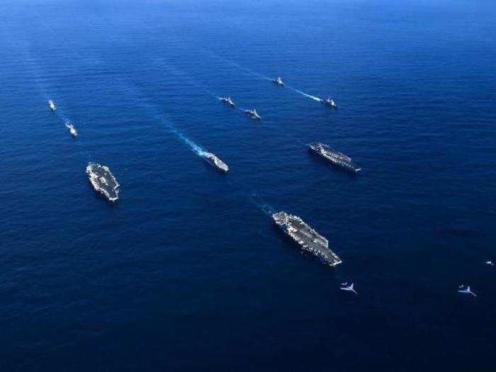 The USS Nimitz, USS Ronald Reagan, and USS Theodore Roosevelt aircraft carriers and their strike groups in the Pacific Ocean on November 12.