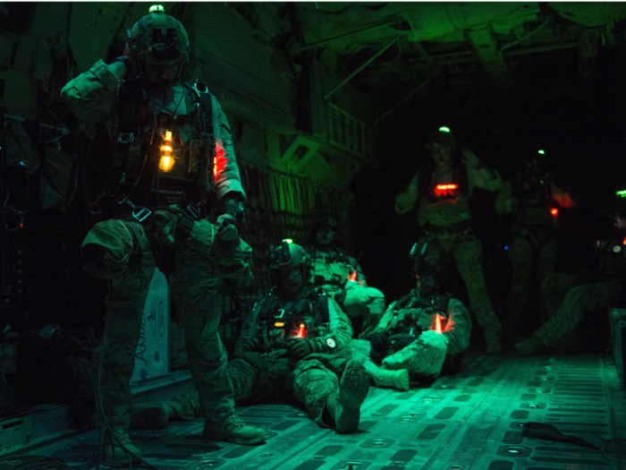 Pararescuemen from the 82nd Expeditionary Rescue Squadron prepare for a night jump from a C-130 Hercules over Grand Bara, Djibouti on March 20.