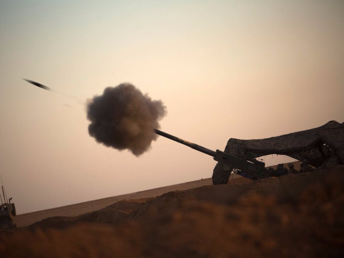 Marines fire an M777-A2 howitzer in northern Syria on May 15.