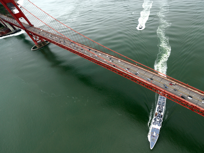 Coast Guard Cutter Munro passes under the Golden Gate Bridge on its way into the Bay Area on April 6.