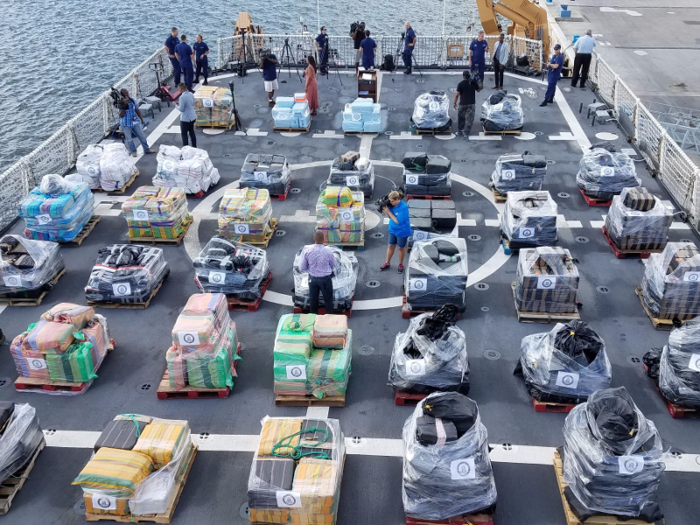 US Coast Guard Cutter Hamilton unloads about 18.5 tons of cocaine — worth $498 million — seized in 20 separate incidents in international waters in the eastern Pacific Ocean, at Port Everglades, Florida on May 18.