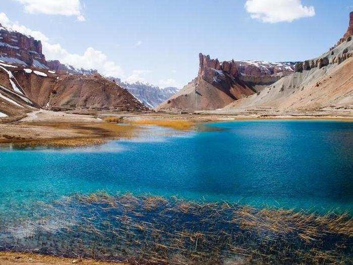 Among these peaks lie stunning lakes ...