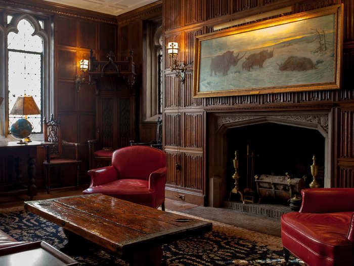 The front sitting room is suffused with history, including many 15th- and 16th-century fixtures from Europe. The wood coffee table was originally a hatch cover on the USC&GS Explorer, a survey ship and research vessel that was one of the few ships to survive the 1941 Pearl Harbor attack.