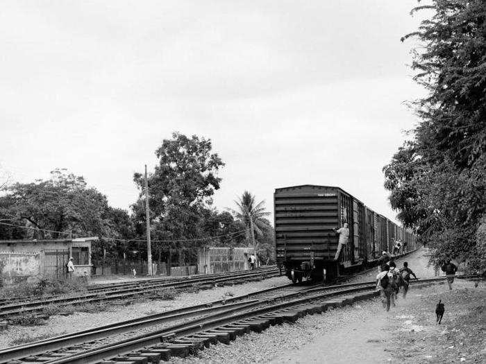 To make the trip north, migrants must pass through numerous areas dominated by Los Zetas, one of the most dangerous cartels in Mexico. In recent years, the cartel has established a profitable racket by kidnapping migrants. Here, migrants chase after a train in Veracruz, a Zetas hotspot.