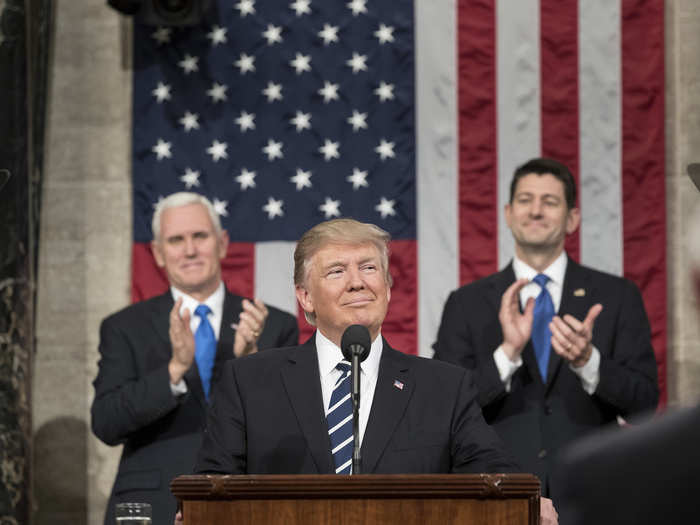 February 28, 2017: Flanked by Vice President Mike Pence and House Speaker Paul Ryan, Trump delivers his Joint Address to Congress at the US Capitol Building in Washington, DC.