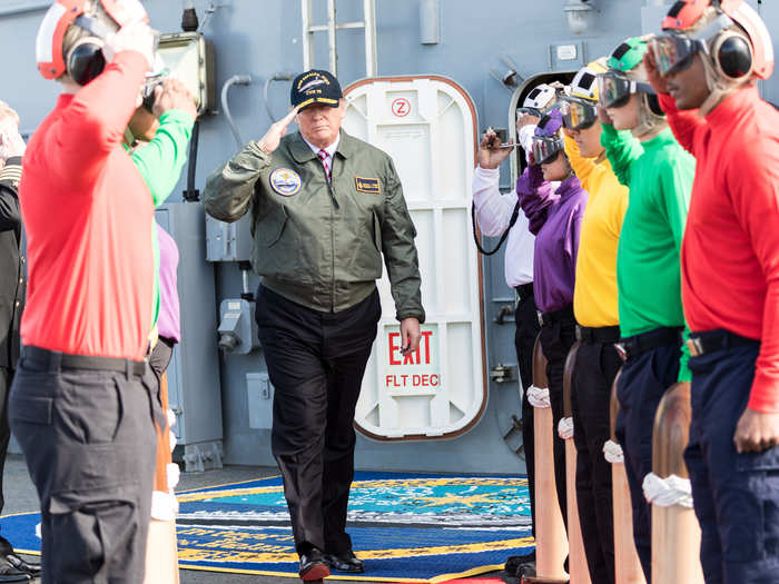 March 2, 2017: Trump salutes sailors before boarding Marine One on the PCU Gerald R. Ford, Newport News, Virginia, en route to Langley Air Force Base in Hampton, Virginia.