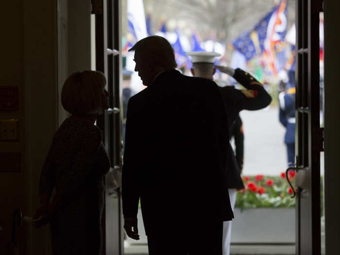 April 3, 2017: Moments before Egyptian President Abdel Fattah Al Sisi arrives at the West Wing Lobby of the White House, Trump talks with a staff member.