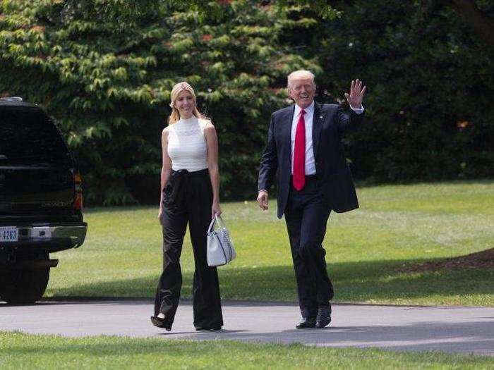 June 13, 2017: Trump walks along the south lawn of the White House with daughter and adviser Ivanka Trump before boarding Marine One.