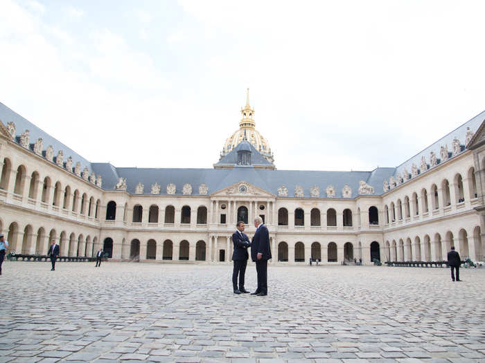 July 13, 2017: Trump shakes hands with French President Emmanuel Macron during his visit to Paris.