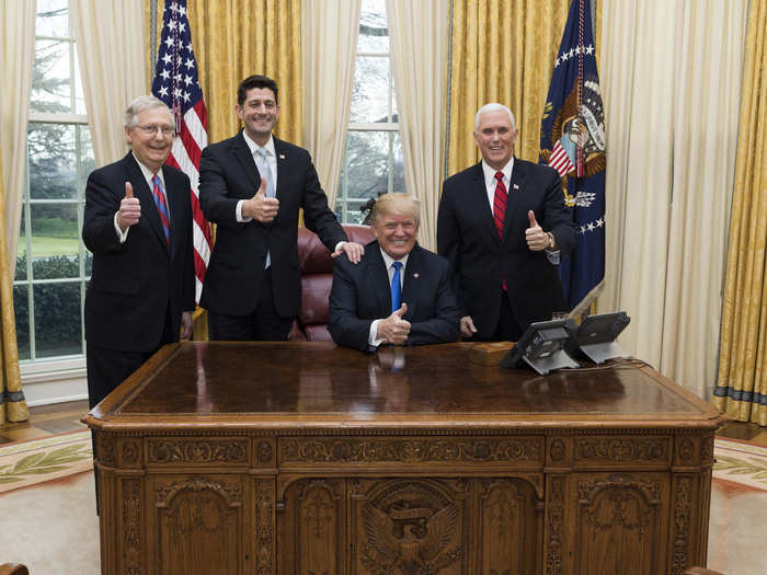 December 20, 2017: Trump celebrates the passage of the Tax Cuts Act with Pence, Senate Majority Leader Mitch McConnell, and House Speaker Paul Ryan.