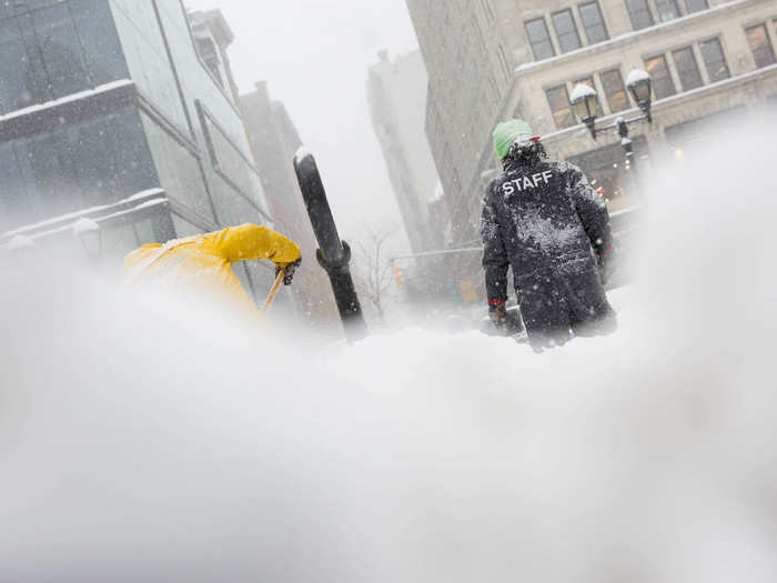 Just city workers shoveling and clearing snow.