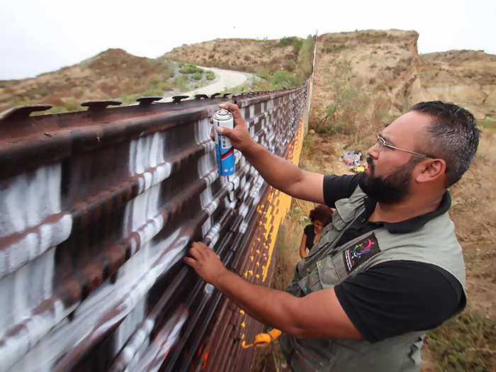 Since then, his team has painted 1.3 miles of works on border fencing in Tijuana, Mexico. Chiu hopes to continue painting on the barriers to create the world