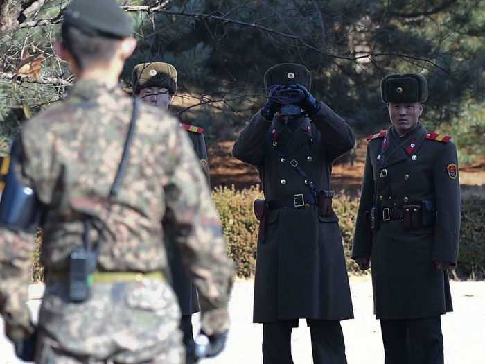 Back in Panmunjom, North Korean soldiers directly face South Koreans. This is next to the spot where a North Korean soldier defected across the border in November.