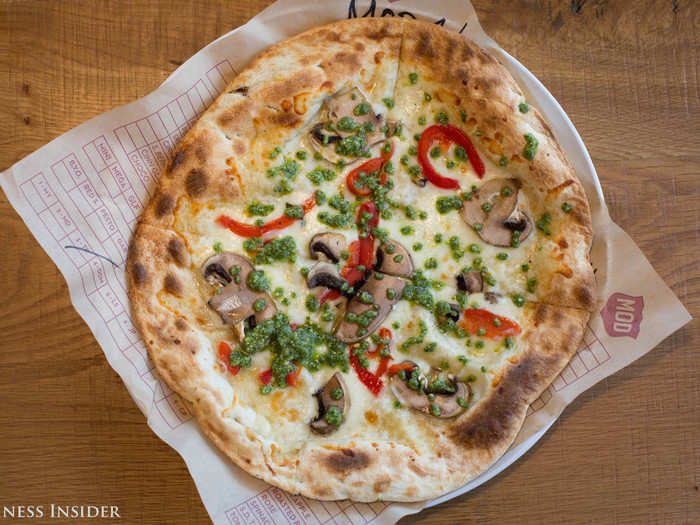 The Tristan, which features mozzarella, asiago, roasted red peppers, mushrooms, and pesto, was understated and delicious. By now, however, I realized the crust was rather tough at the center because of its thinness. It resembled matzah more closely than pizza dough.