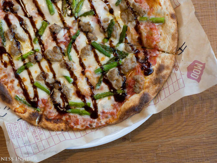 The Crosby, a seasonal pizza topped with mild sausage, roasted asparagus, and a balsamic fig glaze, became an instant favorite. It was sophisticated.