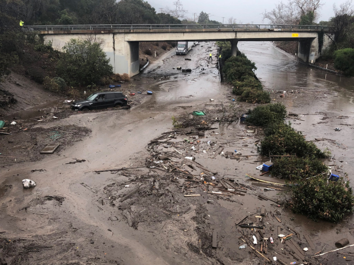 This sunken area of road was totally filled with mud and, making it impossible to pass..