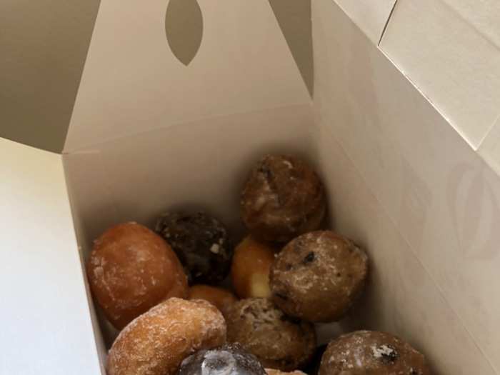 A coworker brings in donut holes, and I eat a few despite how I feel. I skip lunch.