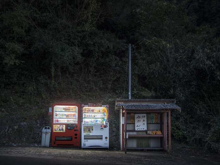 Traditionally, rural areas often have wooden stalls where farmers leave fruit and vegetables for passersby to purchase by leaving the correct change. The vending machines are just a new version of that tradition.