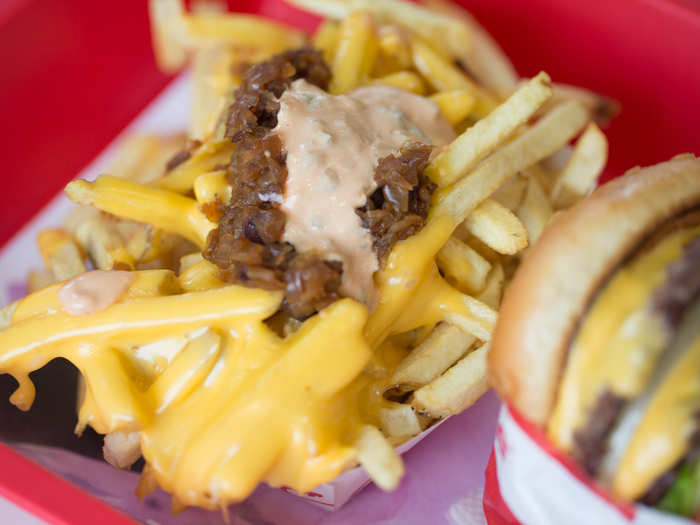 The "Animal Style" fries were another story. Thin scraps of potato, fried in sunflower oil, were covered with a glistening heap of melted cheese, grilled onions, and special sauce.