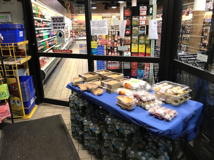 A similar tactic is used at the Gristedes store in Downtown Manhattan, though with a less nutritious approach. Fresh cakes and pies are displayed on a table near the entrance.