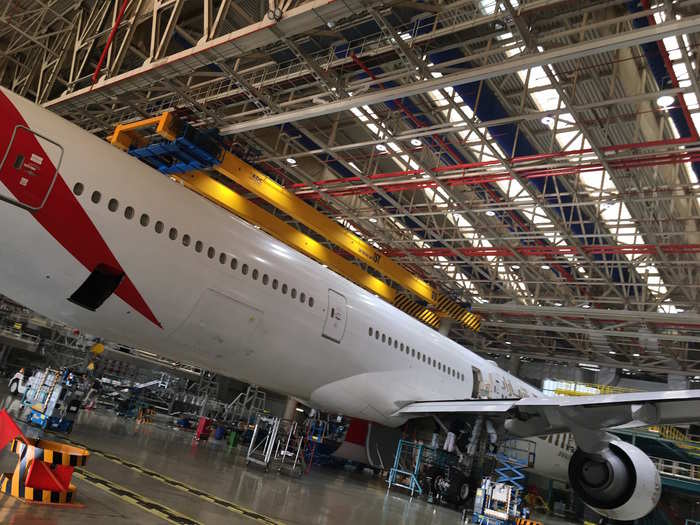 Finally, the last plane in the service hangar is a 777-300ER that is having its landing gear changed.