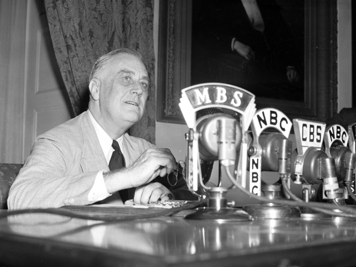 Microphones from various news outlets lined Franklin D. Roosevelt