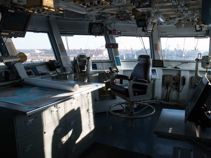 The navigation officer sits next to the chart table. Even though the ship is navigated digitally, they still retain a chart table to "keep those skills fresh," Jones said.