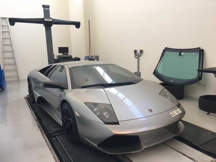 This Murcielago is getting some work done at the dealership