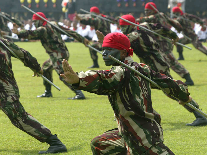 The soldiers also train with staffs.