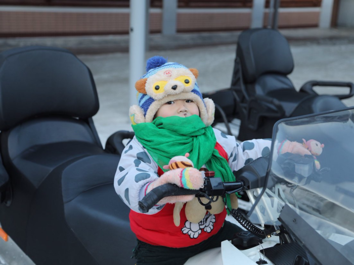 A child is ready to ride one of the resort