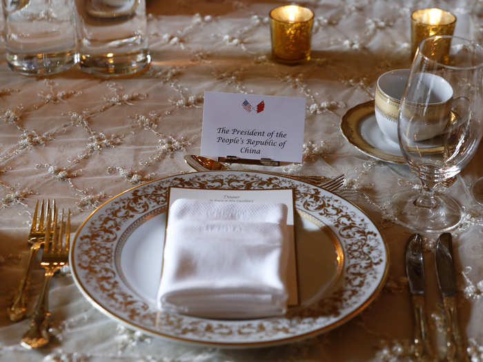 Not a detail was amiss for the visit, including the elaborate plate setting.