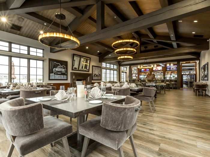 The clubhouse also boasts an event entertainment space, full bar, restaurant, and dining room.