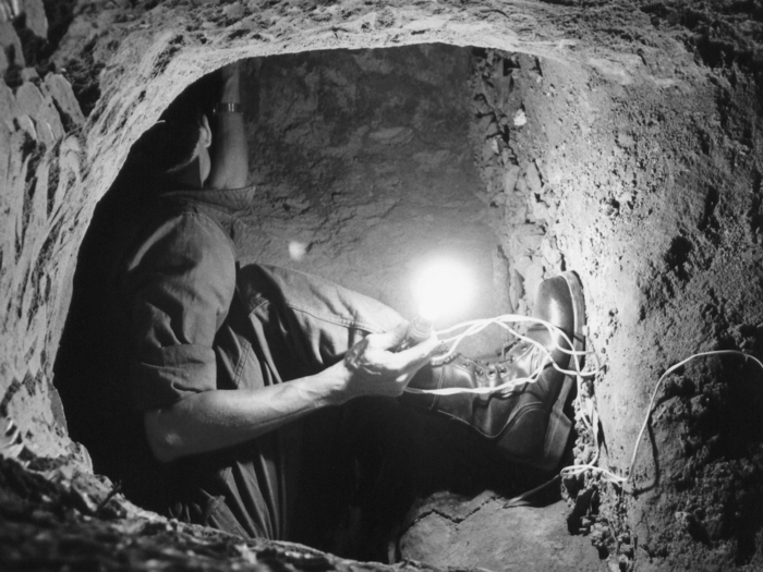 Equipment from the Ho Chi Minh Trail was stored in underground tunnels and bunkers like this one, before being smuggled into South Vietnam