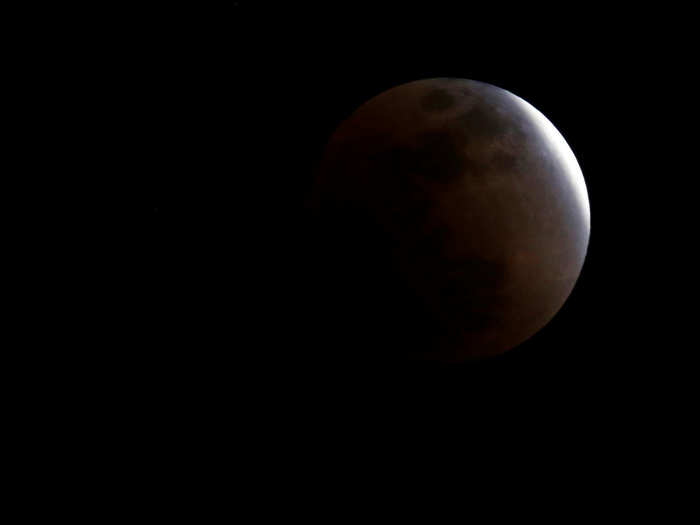 During a lunar eclipse, the moon transitions into partial shadow (called the penumbra) before going into full shadow (umbra) then back into penumbra.