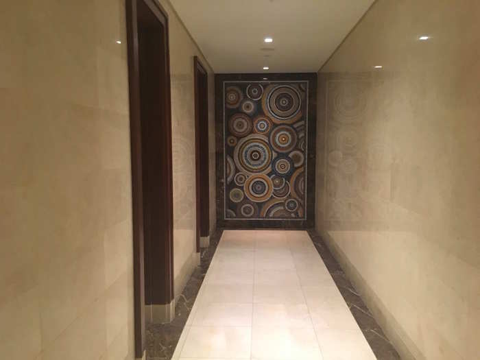 Attached to this Italian marble hallway are...