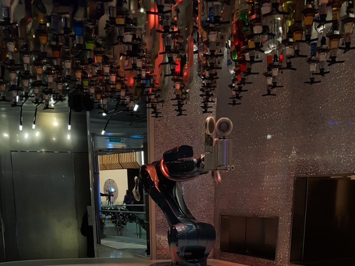 There are two bartenders and a corresponding tablet for each. Customers place their order on the tablet and pay with the room ID card used aboard the ship. Options include popular cocktails as well as some unusual concoctions.