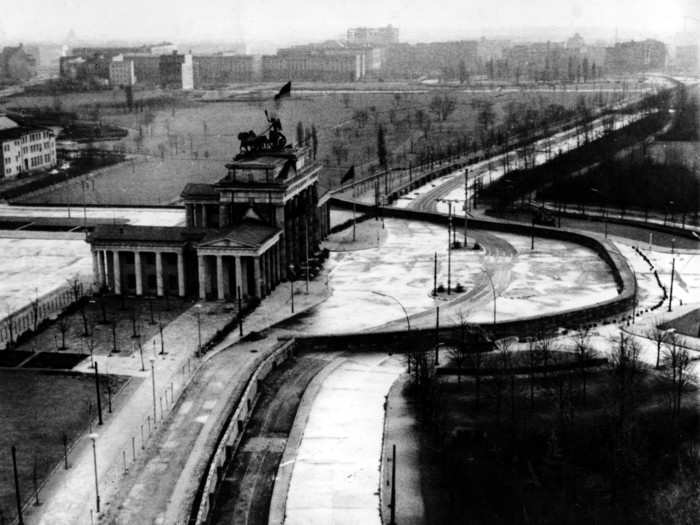 The wall famously ran in front of Brandenburg Gate, a symbol of post-unification Germany. The gate was actually part of a city wall constructed in the 1700s.