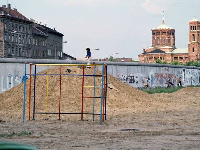 Despite its notoriety, the wall was relatively small in height. In most places, it was only about 11 feet tall, so people could clearly see buildings on the other side, as this 1981 picture of the Kreuzberg district shows.