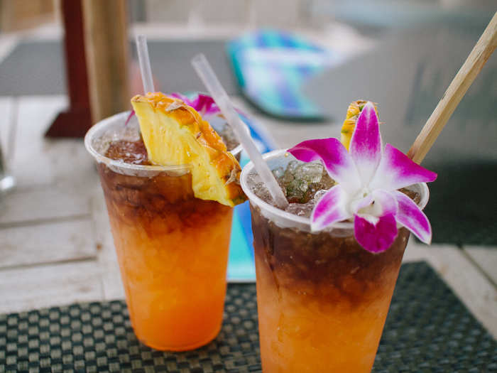 18. Mai Tai. The perfect drink for a tropical vacation, a traditional Mai Tai is made with white rum, fresh lime juice, orange curaçao, dark rum, and orgeat syrup.