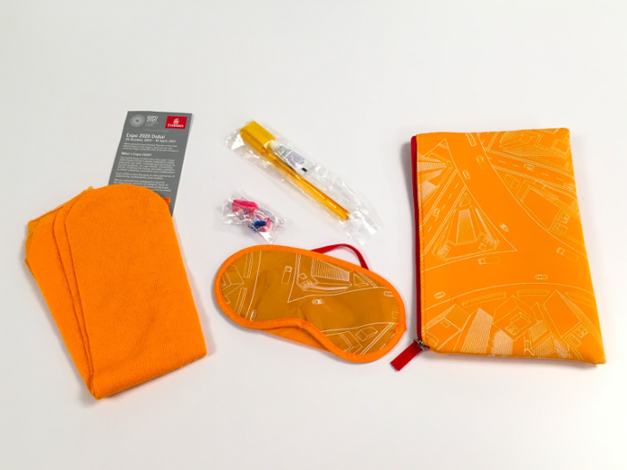 All passengers also received an amenity kit which included socks, ear plugs, a toothbrush with toothpaste, and an eye mask.