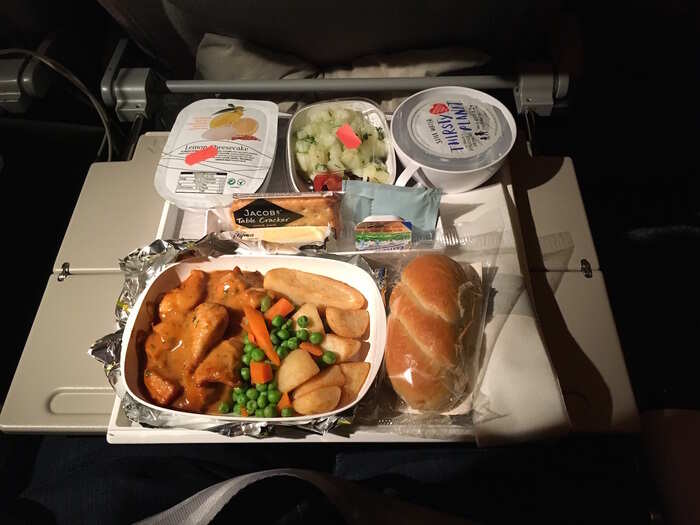 Before landing, dinner was served. With a choice of salmon in a beurre blanc or a chicken and tarragon casserole, I again went for the chicken. The chicken wasn