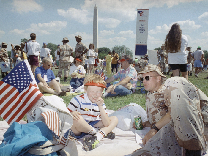 A picnic for service members, such as this Marine captain, followed the parade.