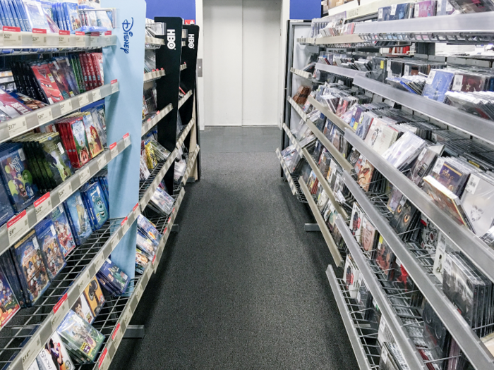 I made my way to the soon-to-be-gone CD section of the store, all the way in the back on the third floor. It was abandoned — there was one employee in the back, and no customers. There was one double-sided display of CDs, which was surrounded on all sides by DVDs.